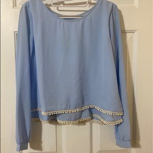 Light blue top w/ cream fringe